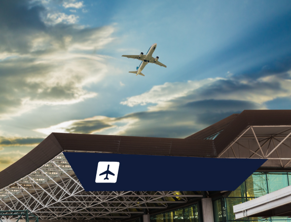 Plane flying over an airport